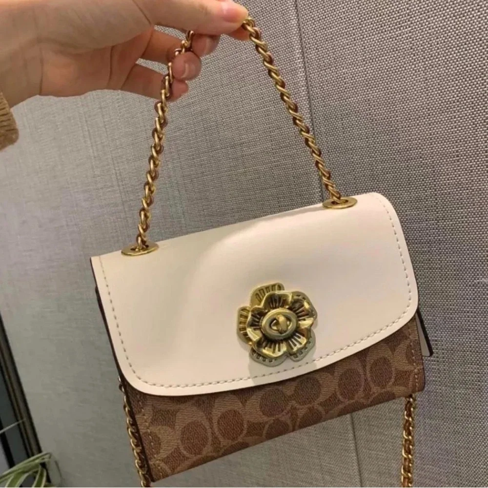 Coach Floral Accent Cream and Brown Clutch Parker 18